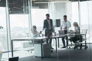 Group of modern, Lawyers, Businesspeople and Investors Gather at the Table in Meeting Room